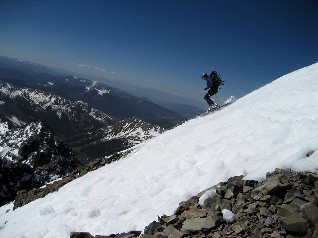 jcwhite skiing off the summit of Castle