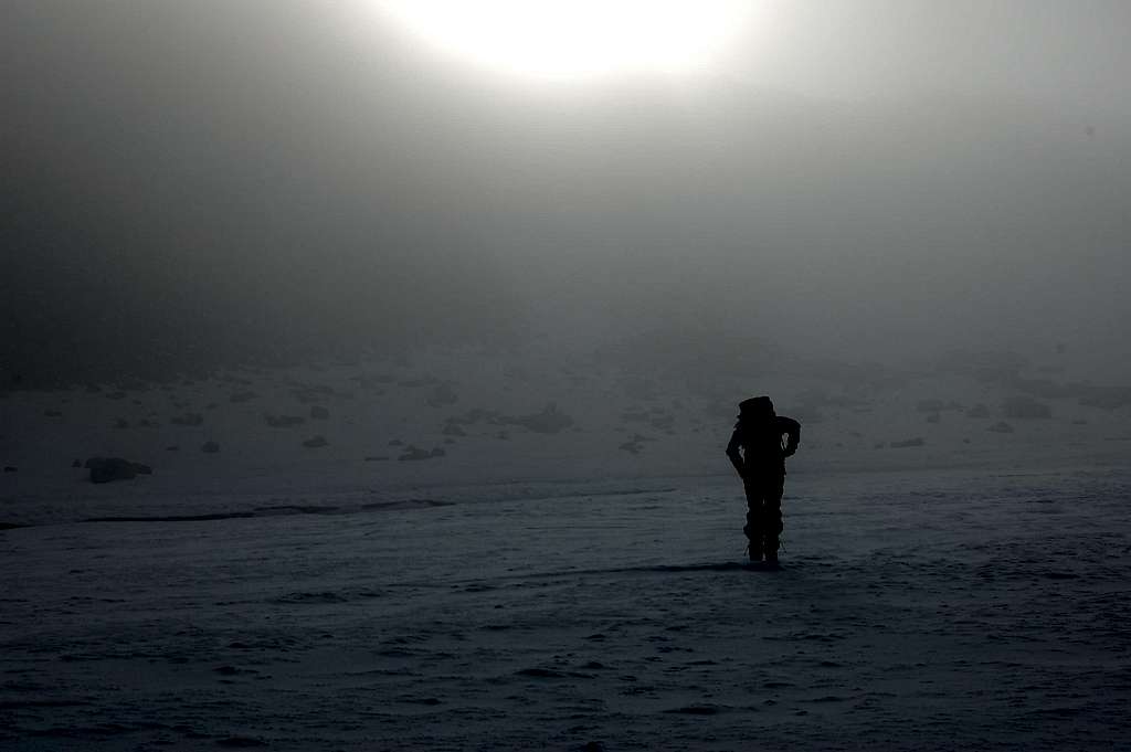 Approaching Store Tverråtind (2309m) from Svellnosbrean Glacier in white-out conditions