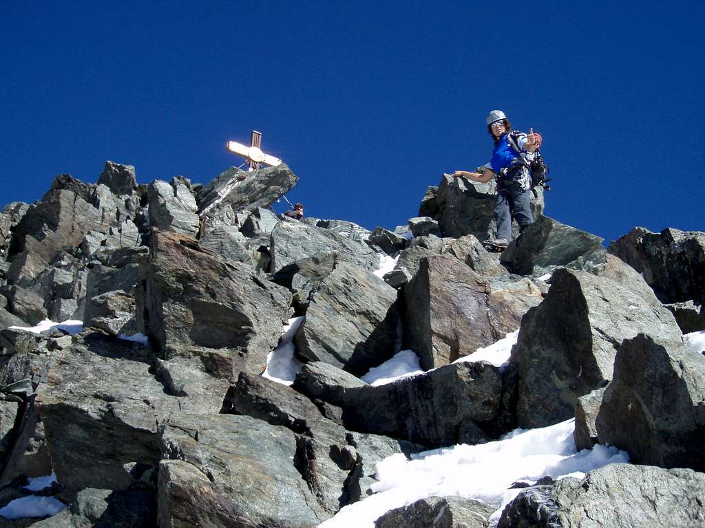 thumbs up from Alex right beneath the summit