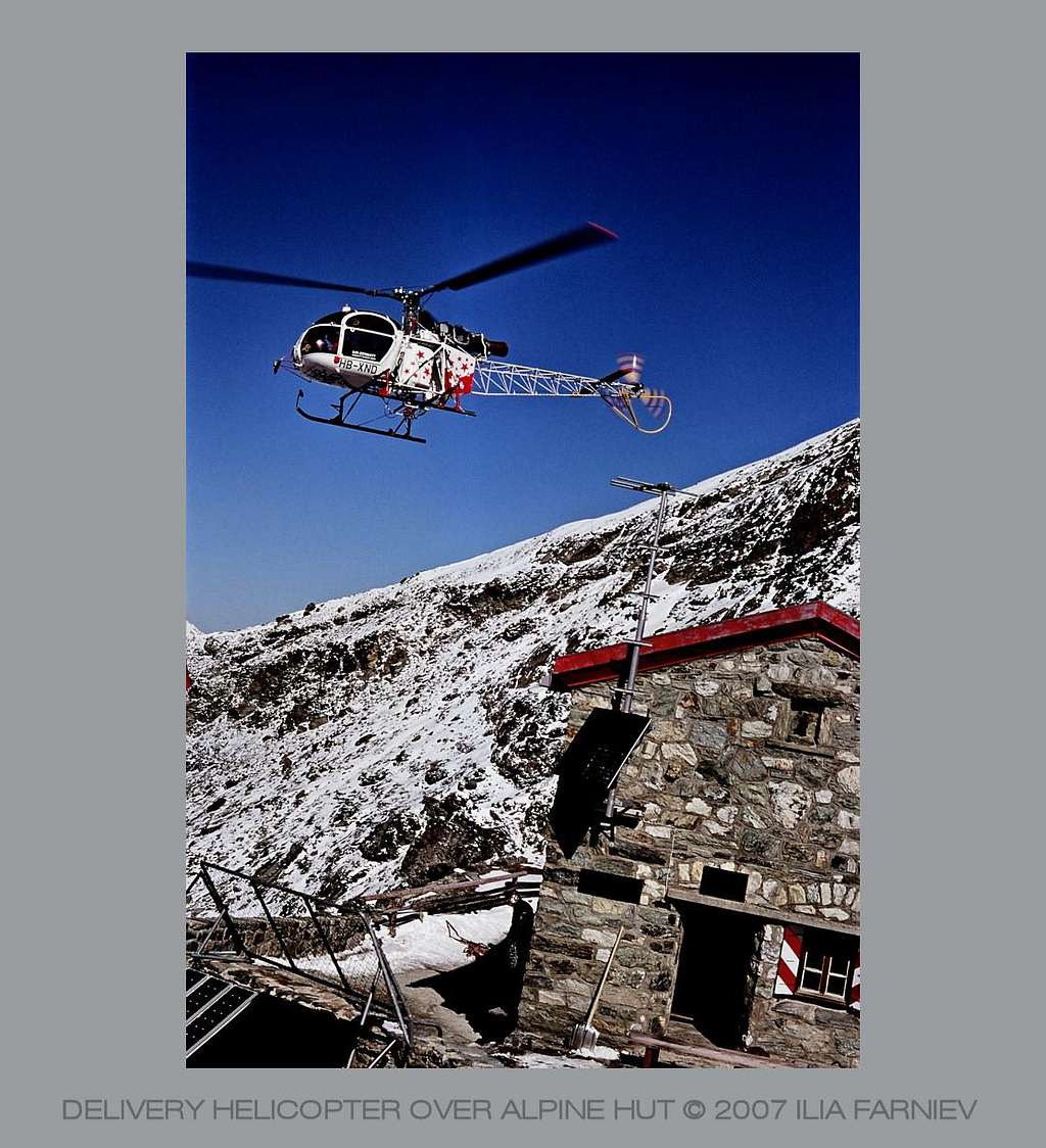 Delivery helicopter over Tracuit hut