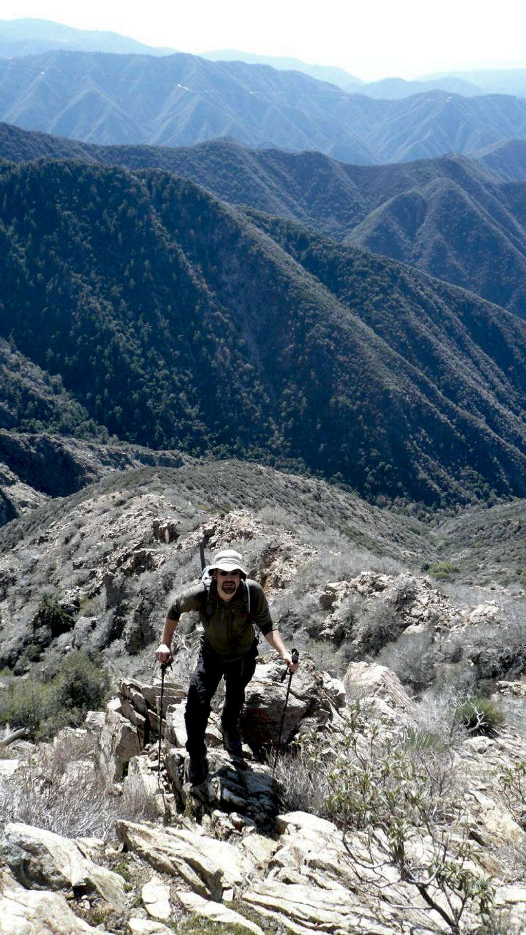 Travis ascending to Iron's southwest ridge