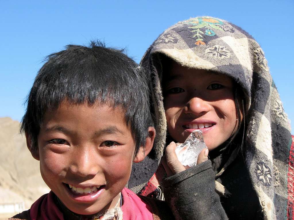 Tibetan girls savouring ice...