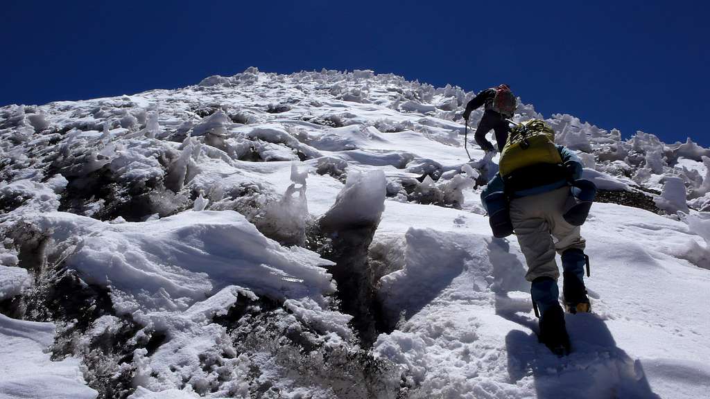 Climbing snow field high on Catedral
