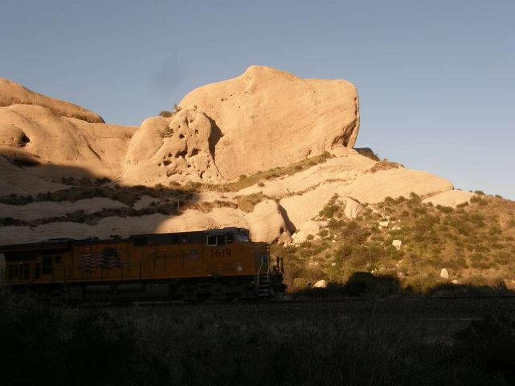 Train speeding through Mormon Rocks