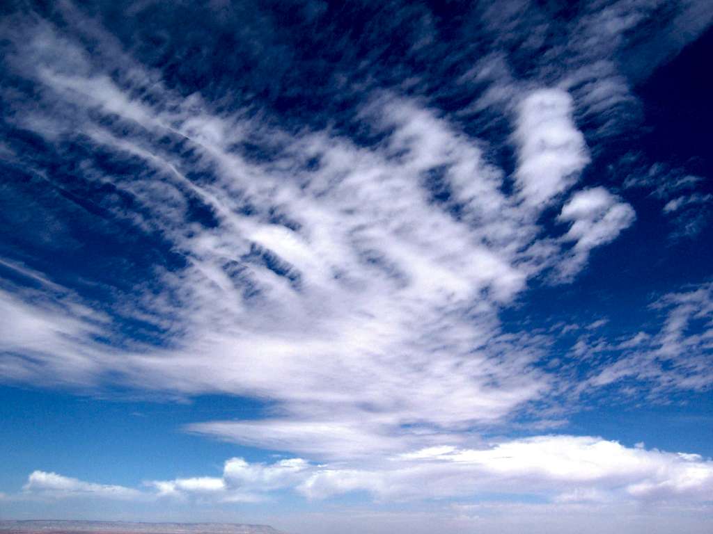 Clouds across an azure sky, Canyon de Chelly