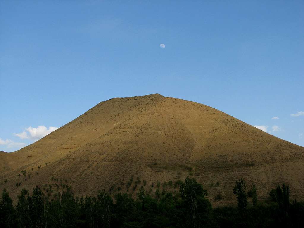 Moon & light on hill