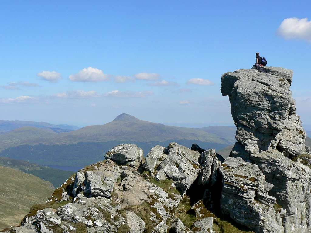 Lone climber on the summit rock