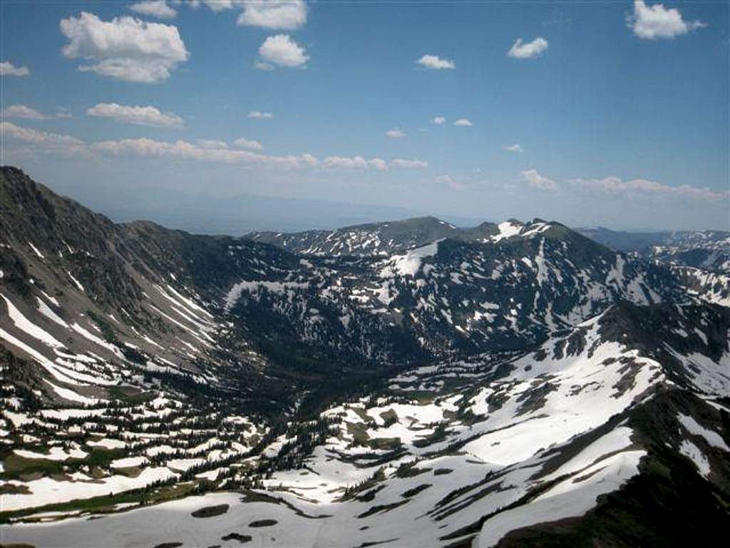 The snow-covered basin from the ridge top
