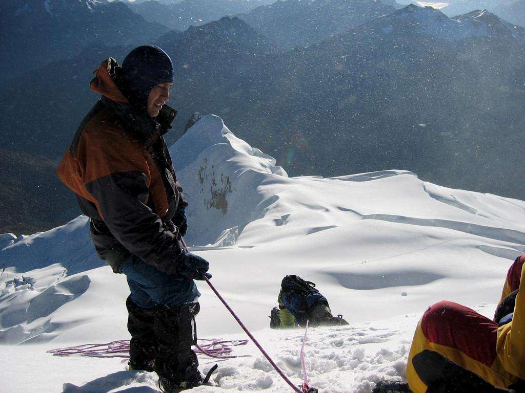 client taking a breather below the summit