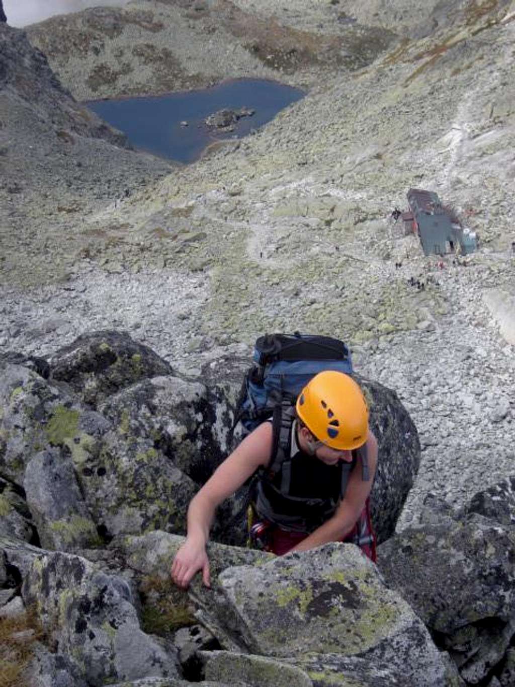 Ascending the traverse of Cesky summit...deep view on Frog Lake and the hut