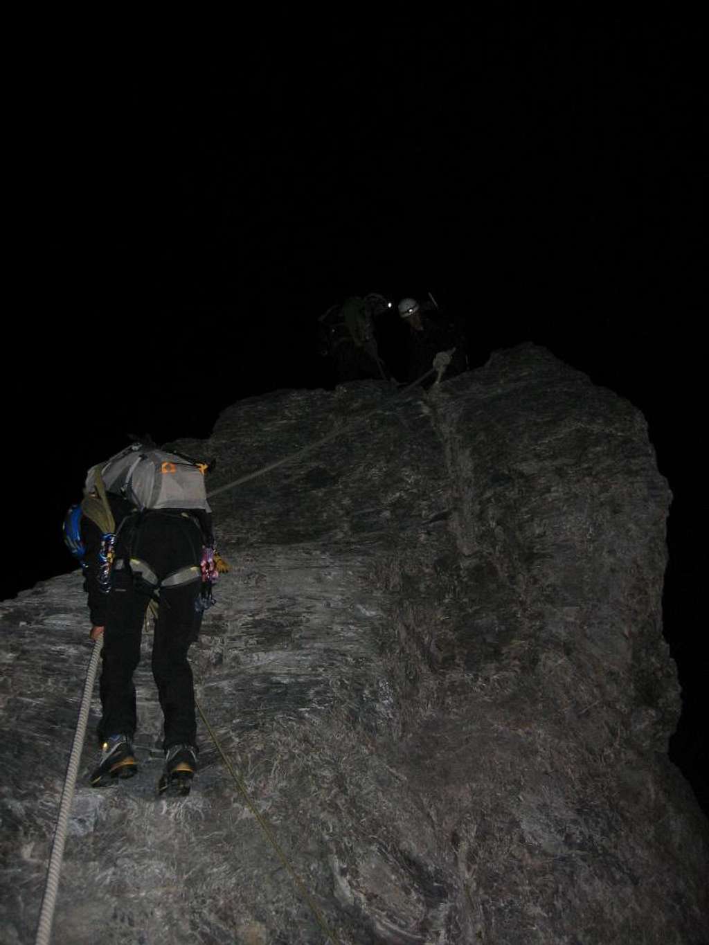 Ascending a fixed rope before sunrise