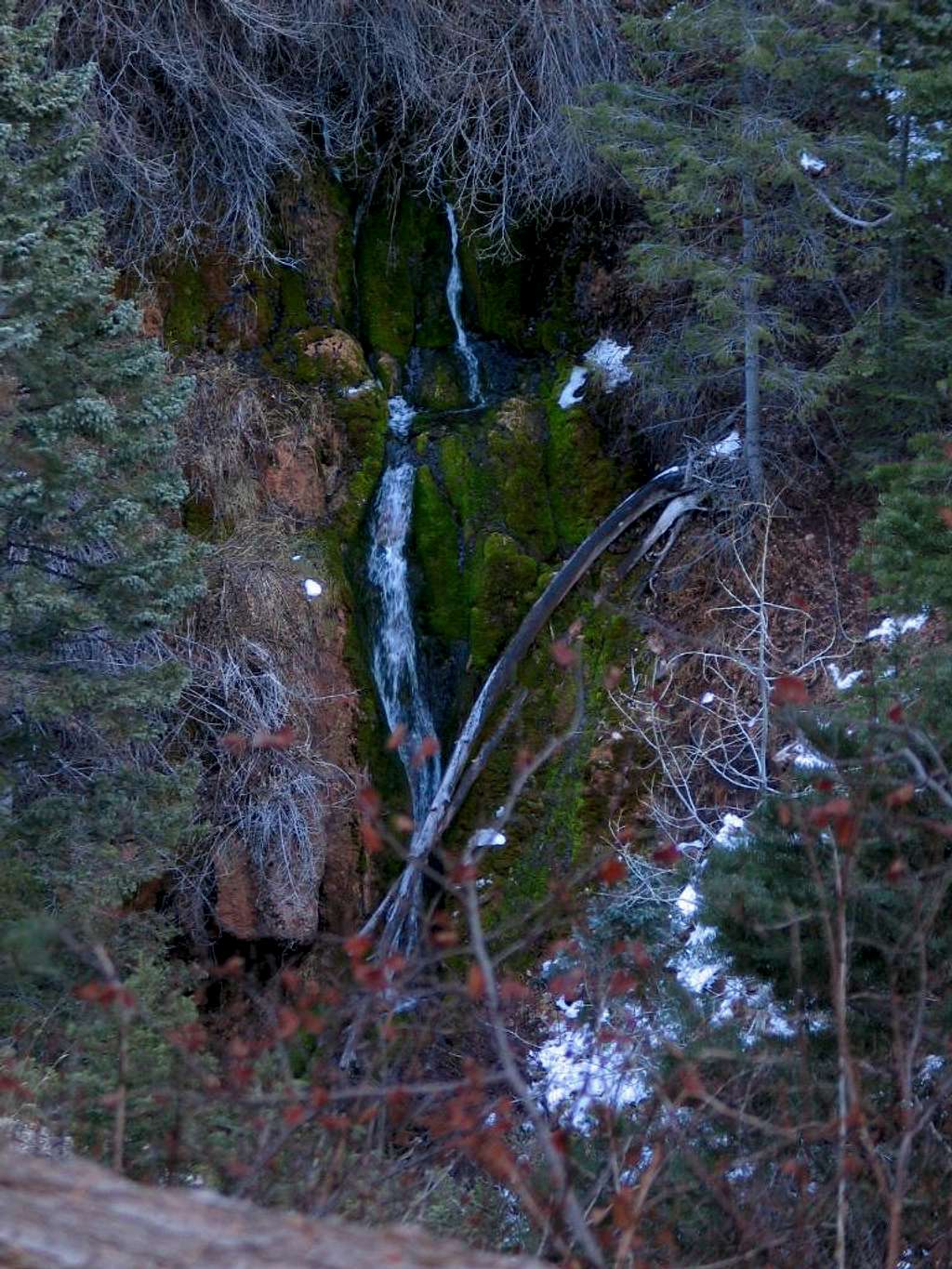 An enchanting waterfall across the deep gorge.