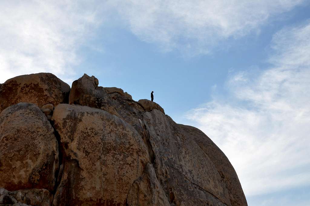 Man atop Intersection Rock