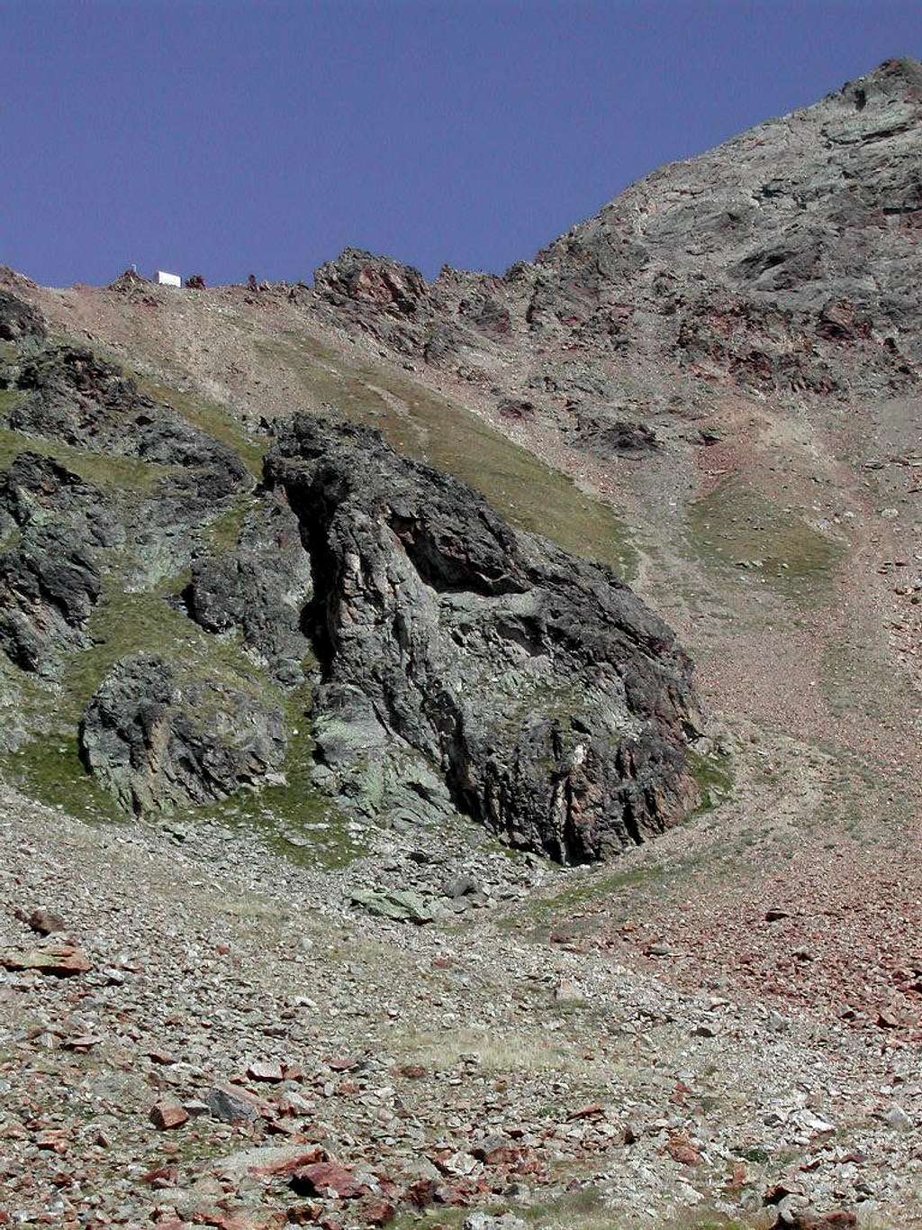 At the end of the descent, looking back at  Bivacco Federigo Zullo (Col Carrel <i>2852 m</i>)