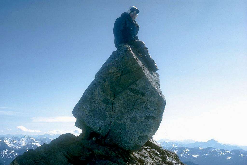 Yours truly sitting on Dome Peak's summit boulder
