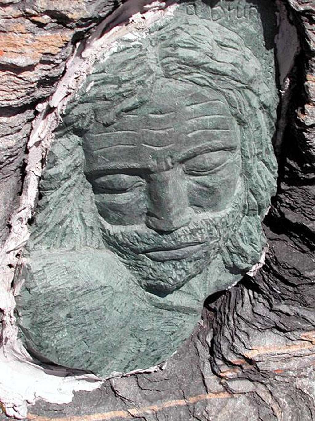 Sculpture nestled in the rocks near the summit of Lancebranlette