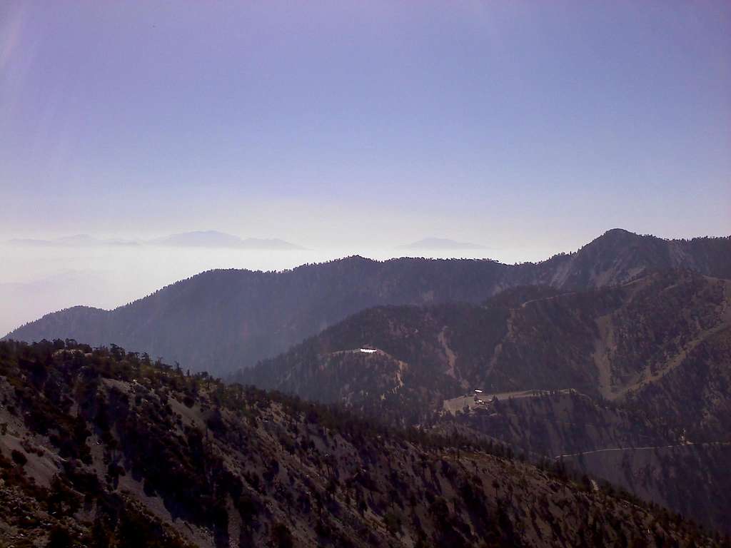 Looking ESE... San Gorgonio is poking through the clouds on the left, San Jacinto on the right