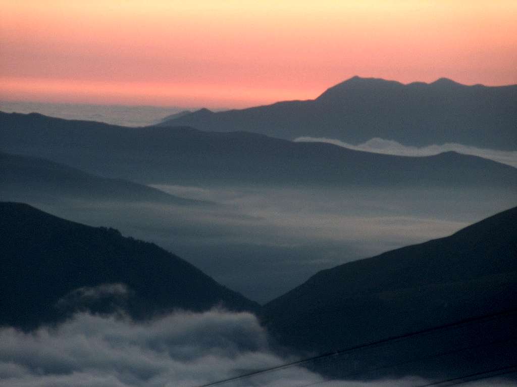 Aea of clouds at sunrise, looking East to the Louron and Luchon valleys