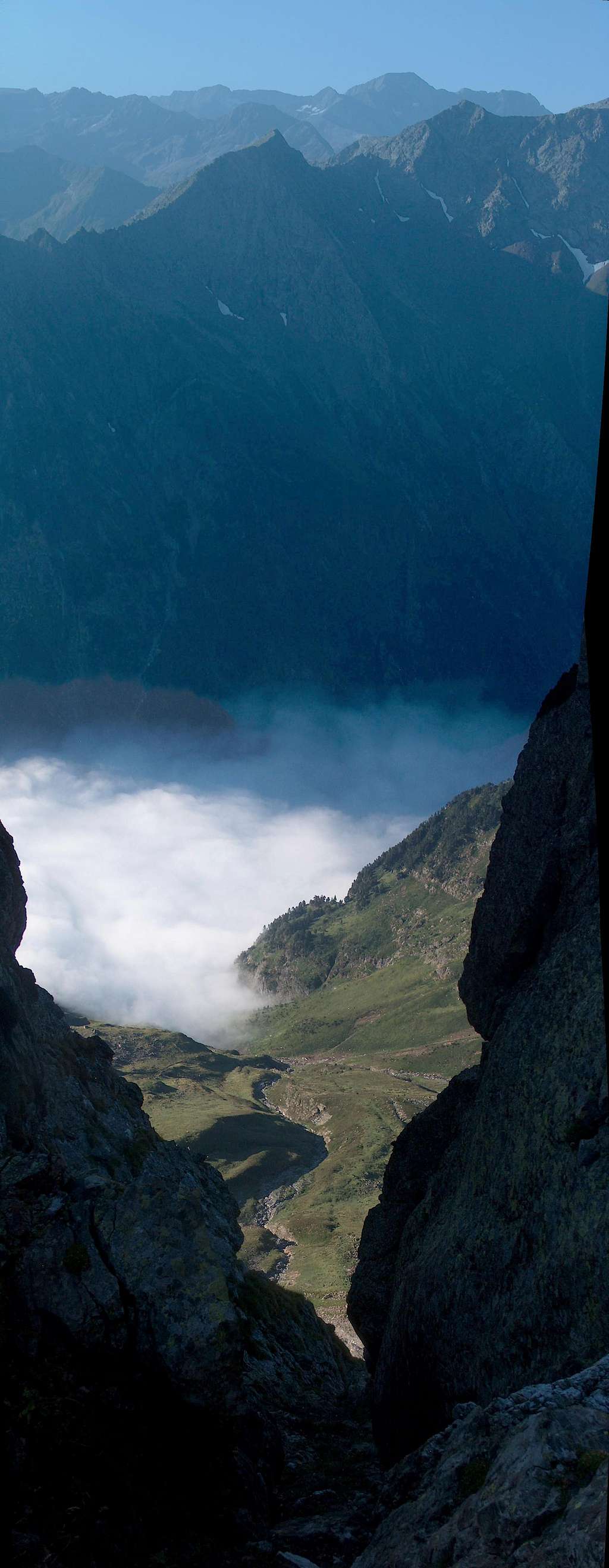 The cloudy Vallon de La Pez while ascending Pic d'Estos