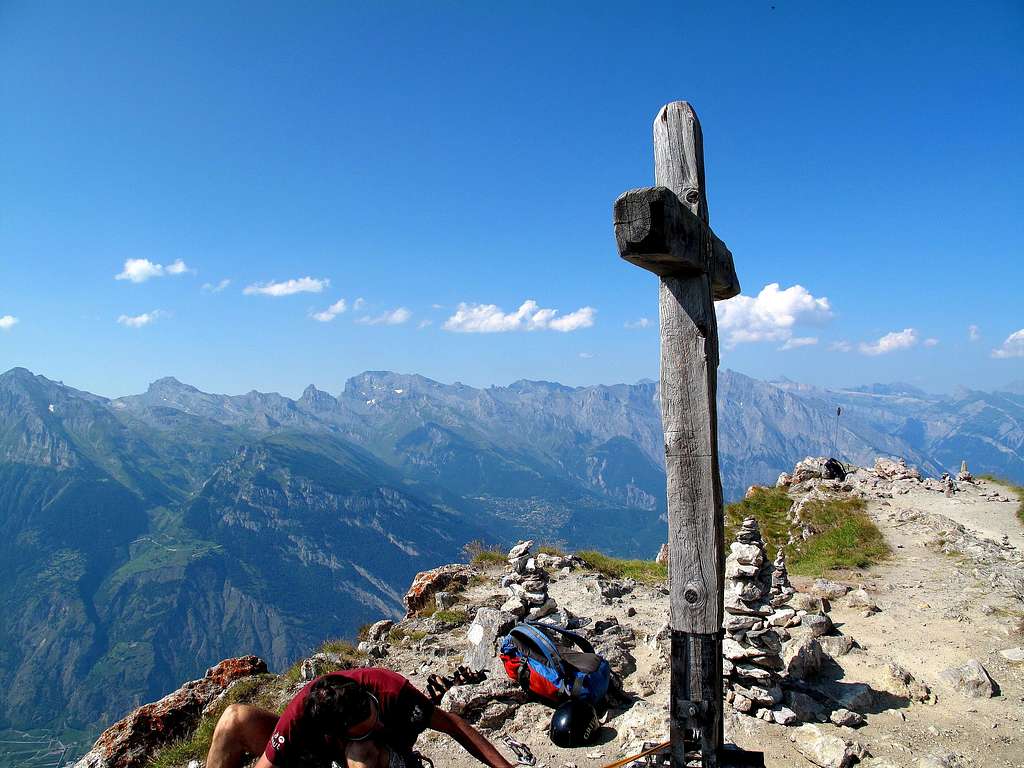 Summit of Pierre Avoi (above Verbier) with summit cross and view to the Grand Muvéran (3051 metres)