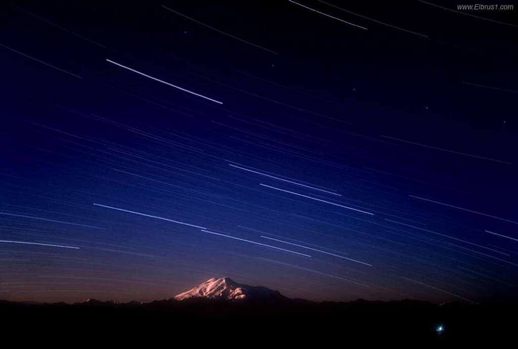 Night light stars movement over Elbrus