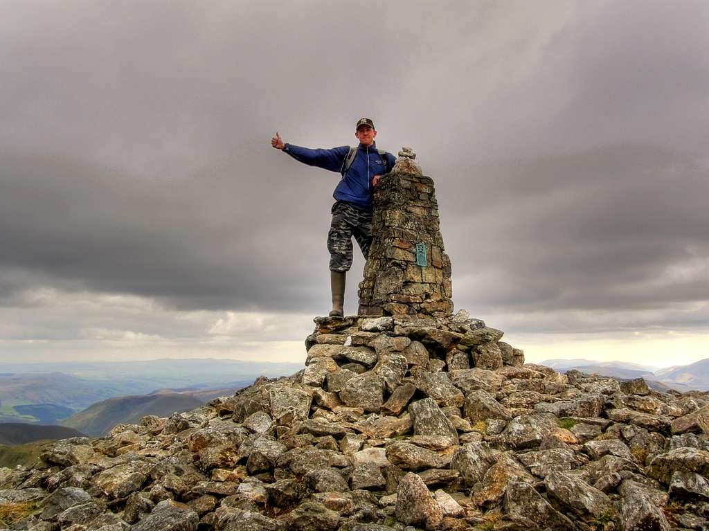 Standing at the summit of Aran Fawddwy