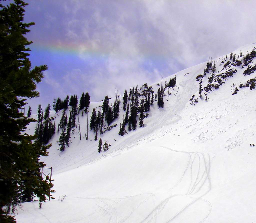 A rainbow in the sky above Clayton Peak