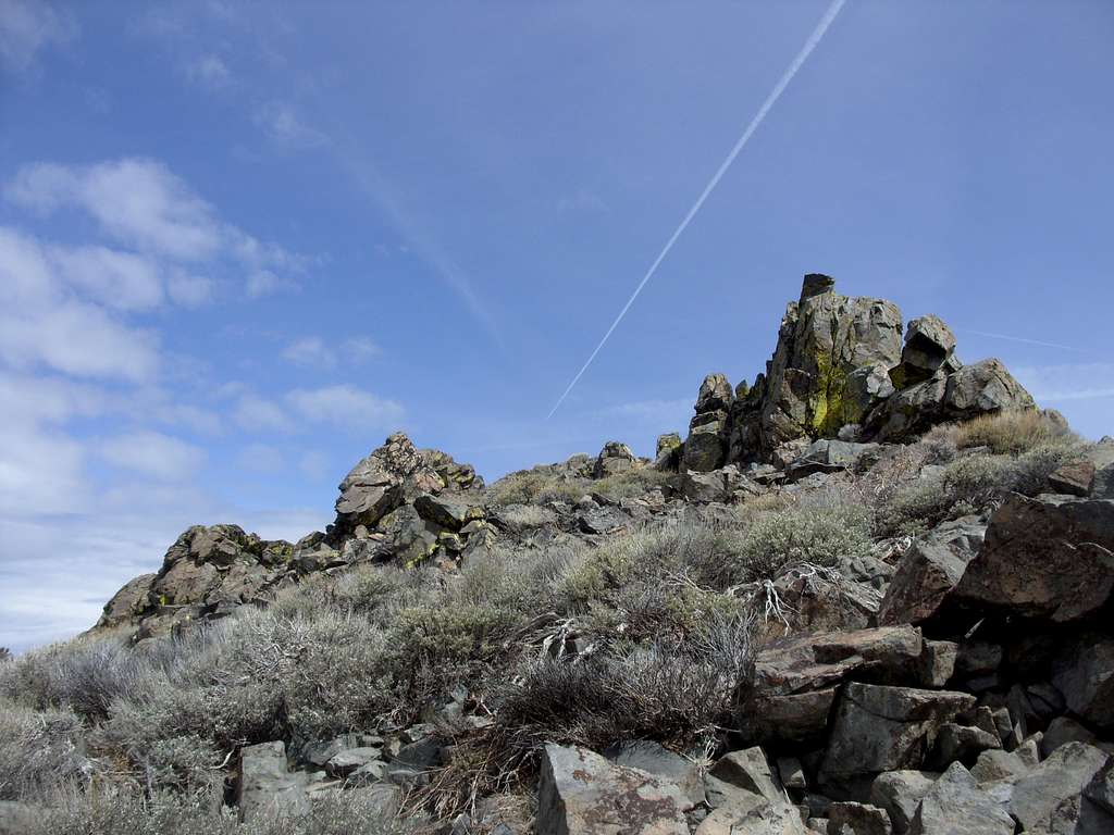Looking up to the summit rocks