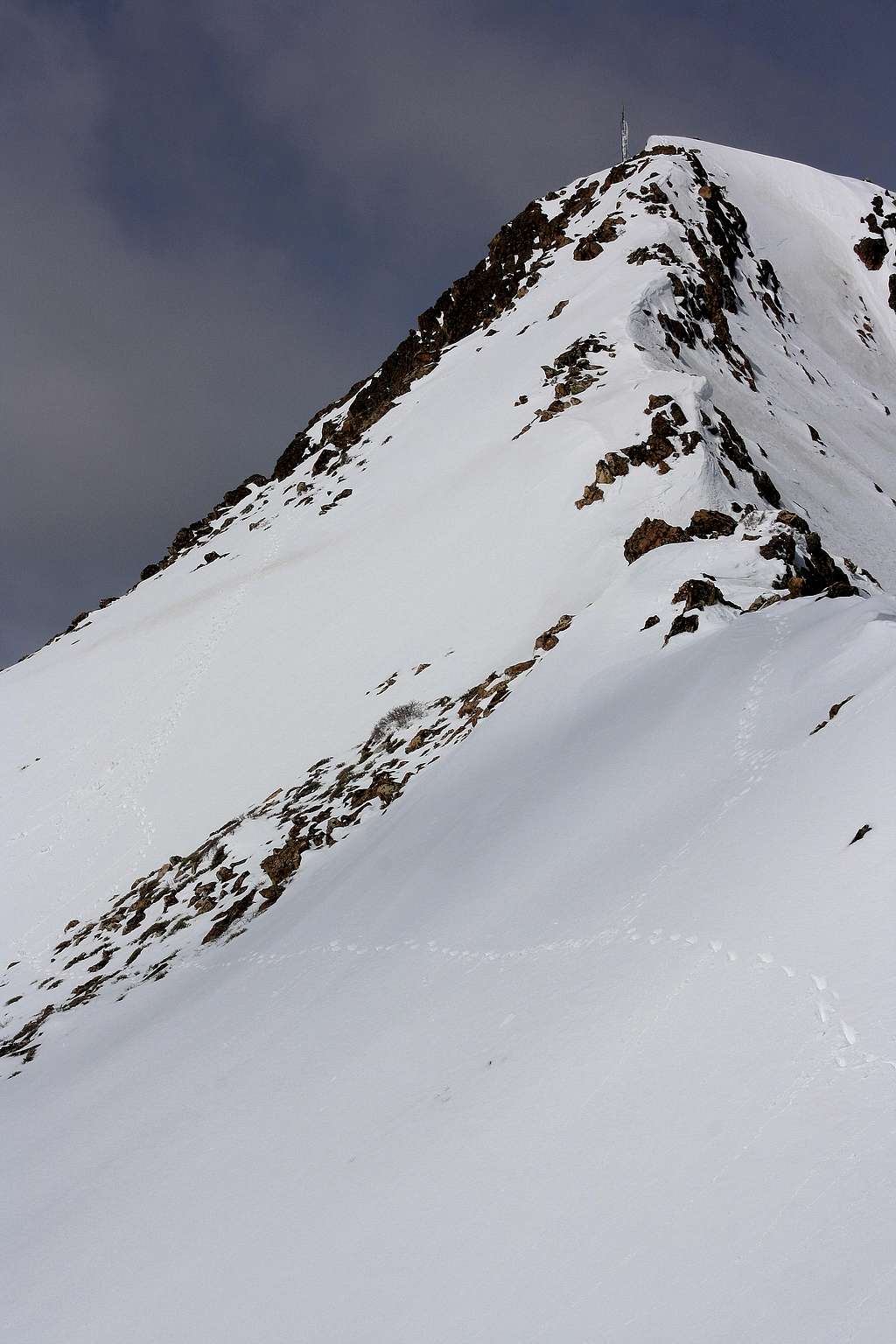 Snowy summit ridge