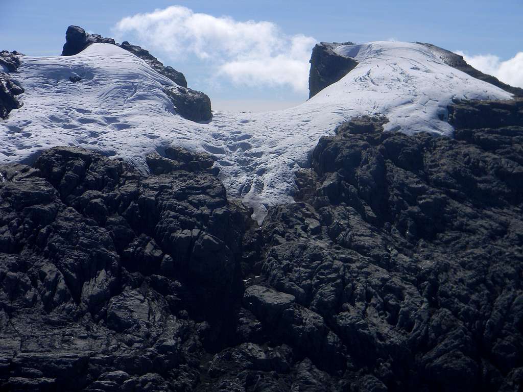 Sumantri (left) and Puncak Jaya (right) from the slopes of Carstensz Pyramid