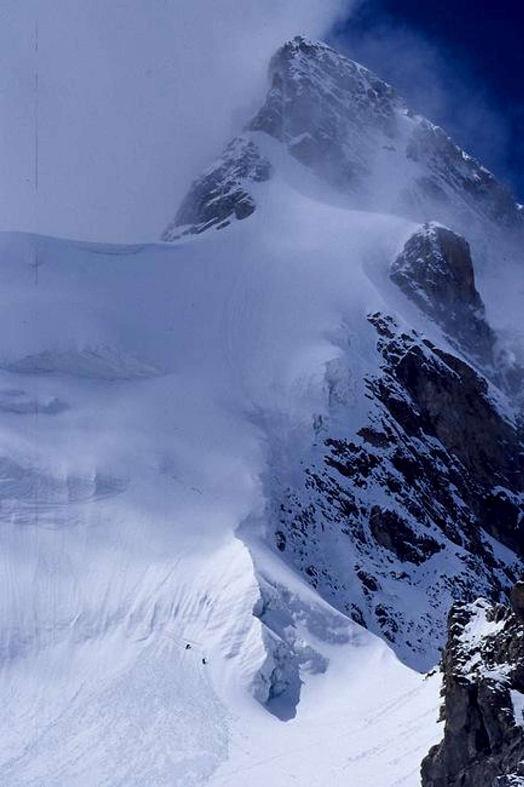 Two climbers at the foot of...