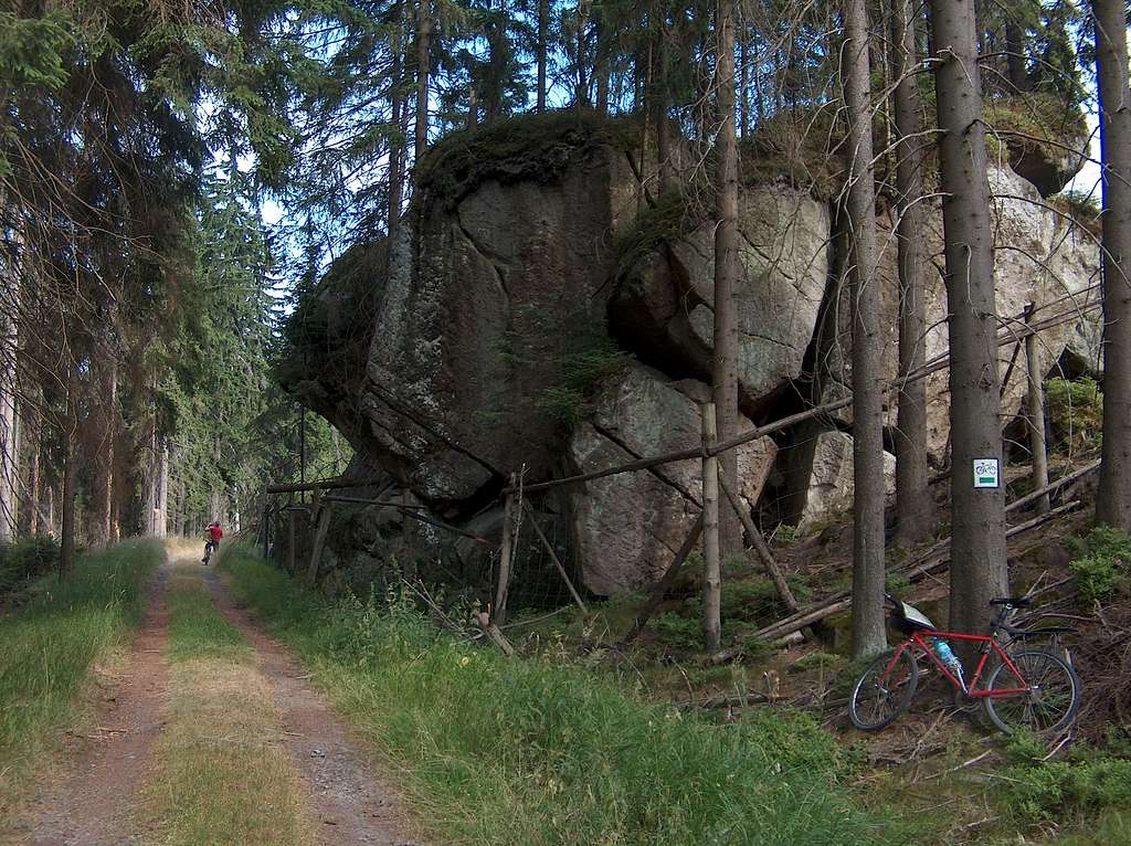 Lone rocks in Góry Stołowe, somewhere in the forest