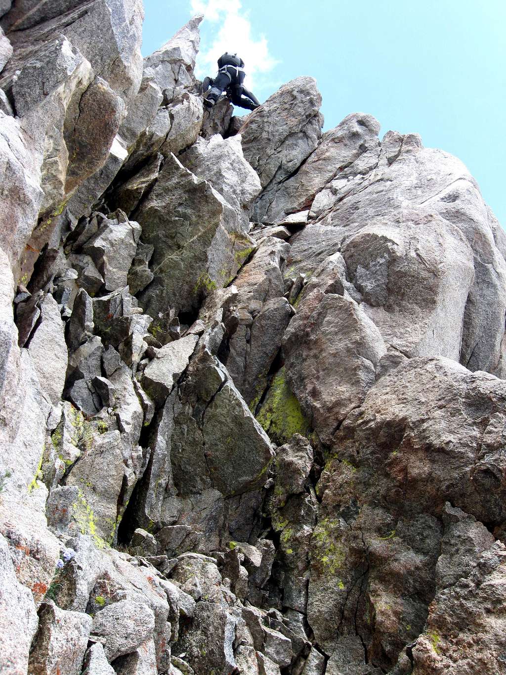 Downclimbing the crux chimney