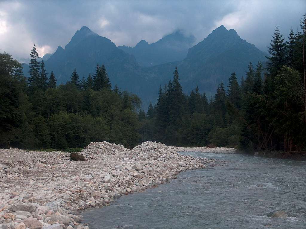 The capricous Bela Voda river carries masses of white granite peebles and boulders after every flooding