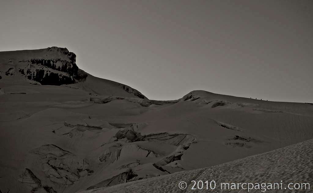 Climbers ascending Mt Baker, along ridge below the Roman Wall