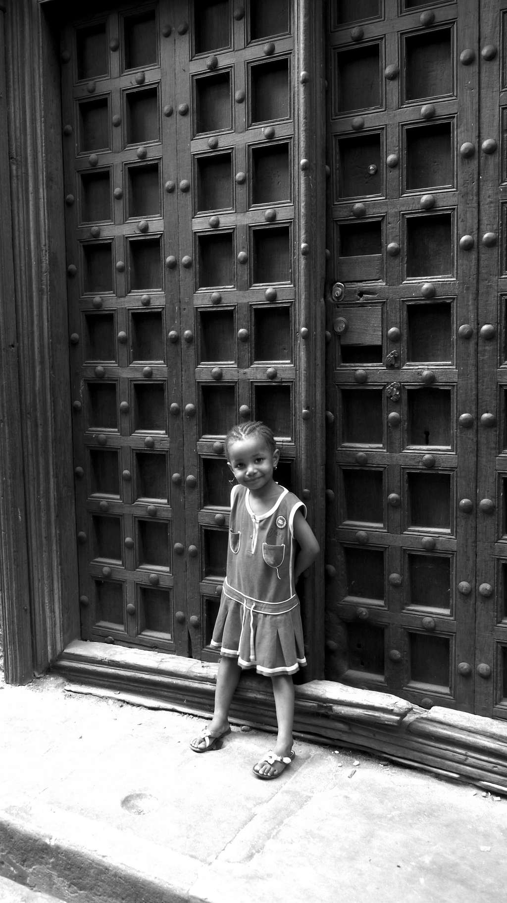 child and a door