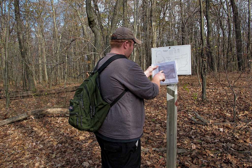 Tim Checks Our Map Against Sign