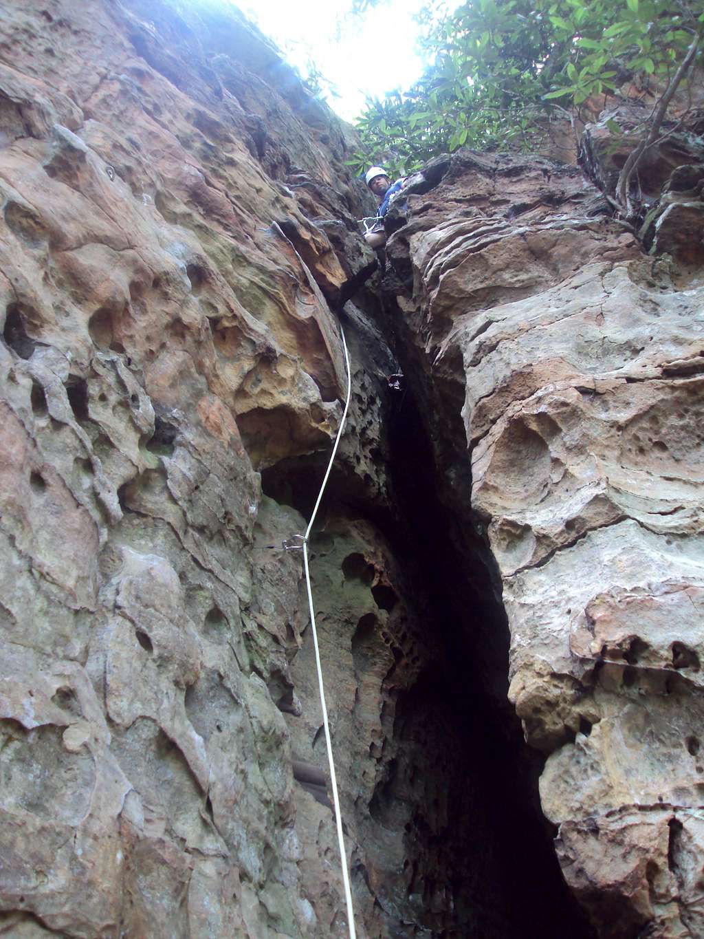 At the top of the first pitch (unknown chimney of military wall) Red River Gorge, June 2010