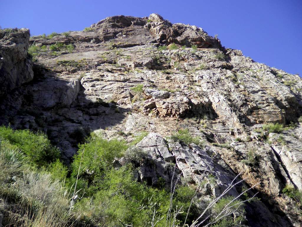 Canyon walls loom above