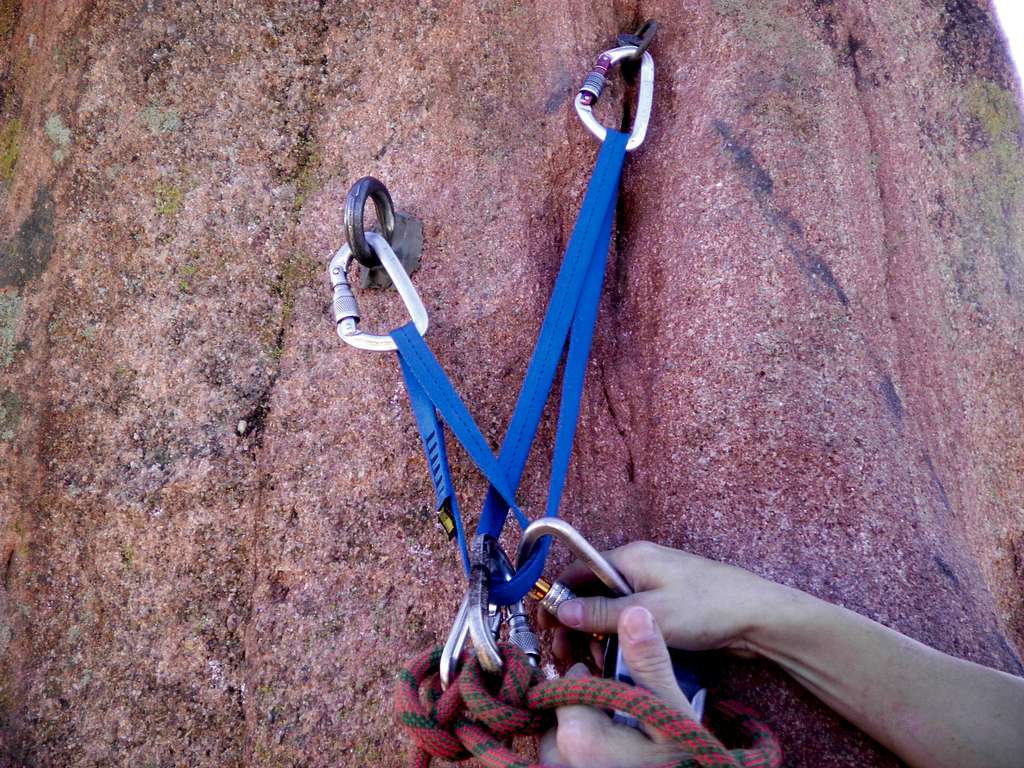 Bolted mid-way belay station