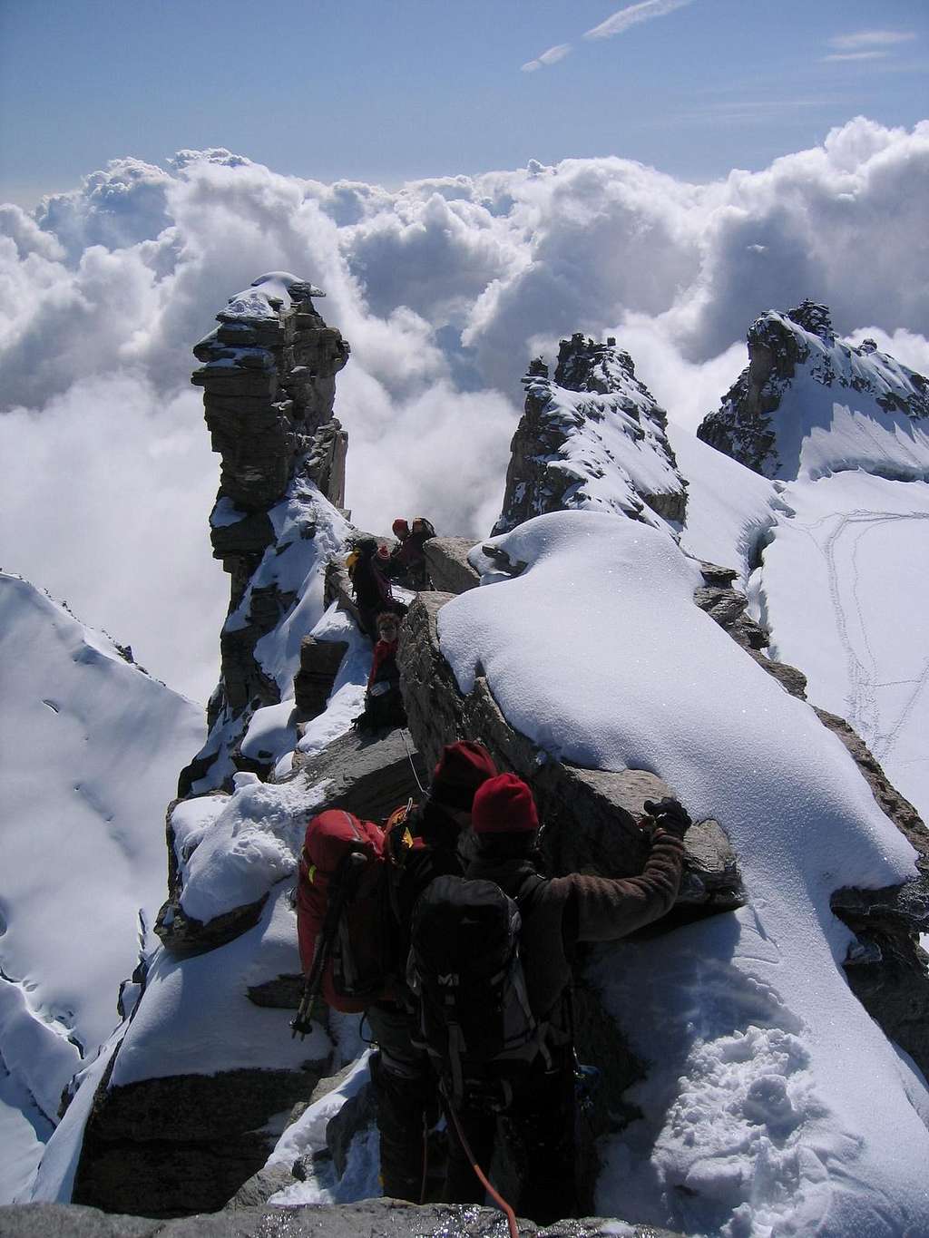 Descending the summit ridge of Gran Paradiso