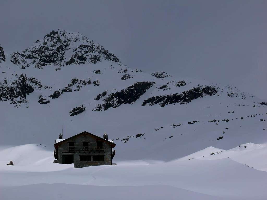 Arriving to Sogno di Berdzé Hut by snowfields in May