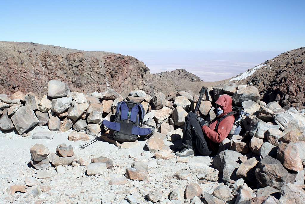 Hiding from the wind on the summit of Licancabur