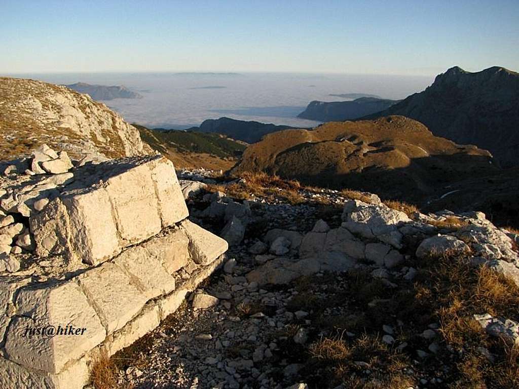 Border stone on top of the mountain