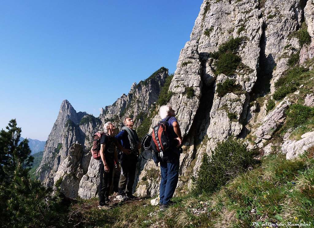 A group of Torre d'Emmele first climbers looking at the cliffs
