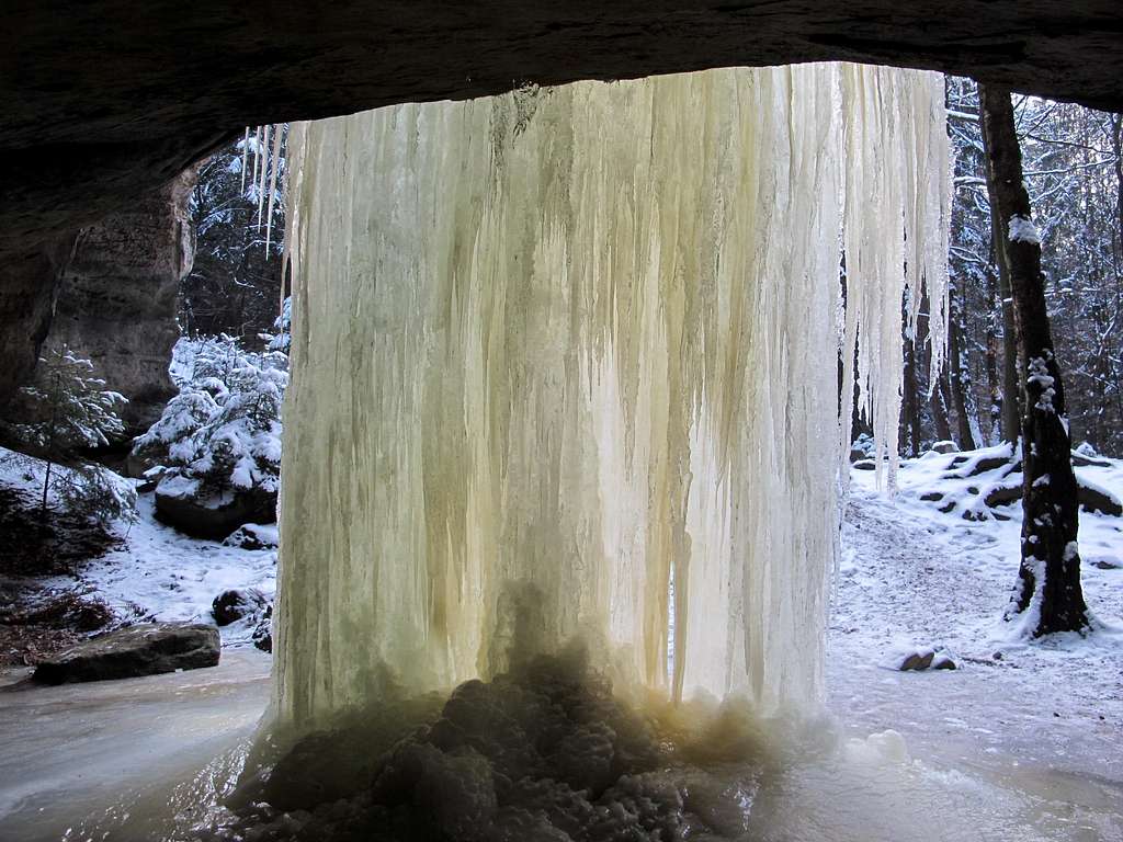 Behind a frozen waterfall