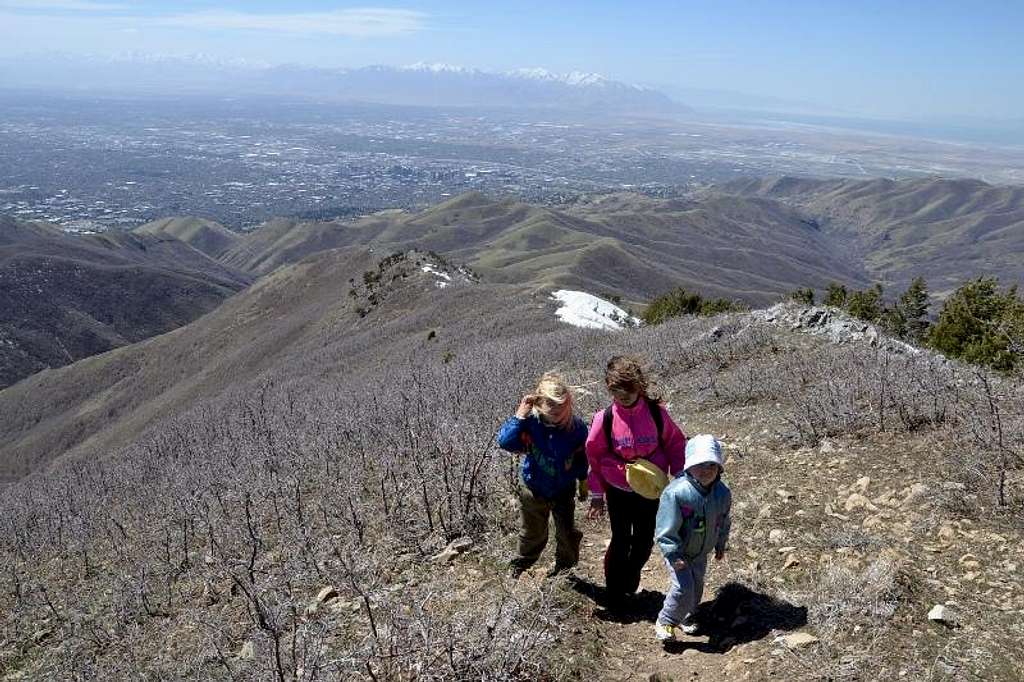 Kids hiking black mountain in a wind up to 40 mph