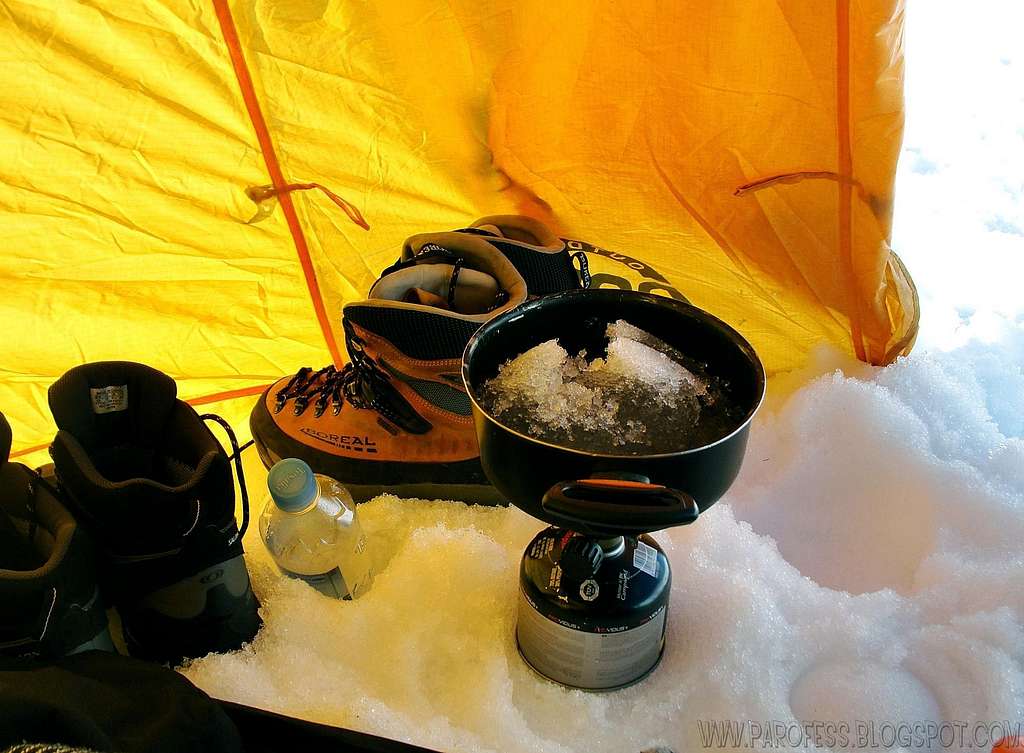 Melting snow to cook on Cotopaxi.