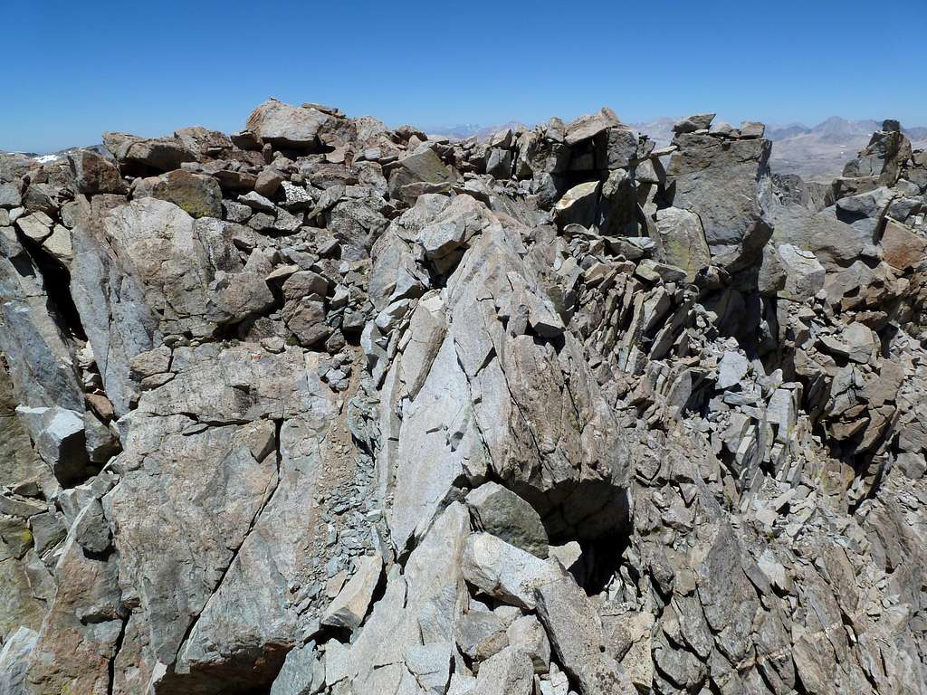 Higher summit to the north