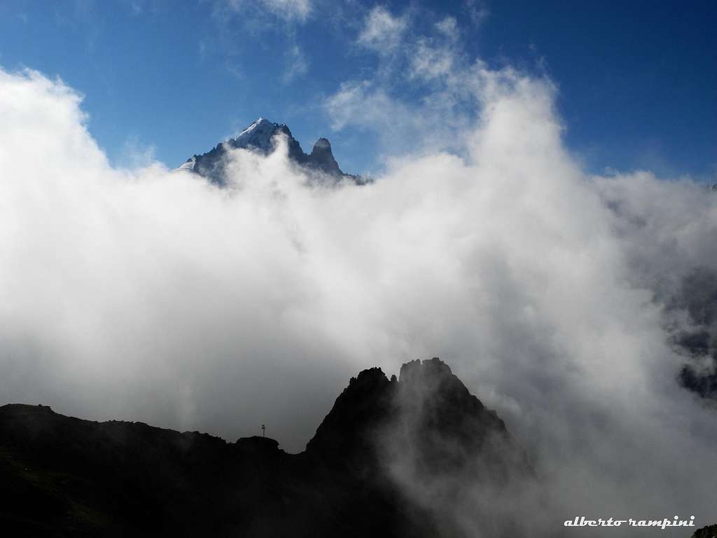 Sea of clouds over Aiguille Verte and Dru